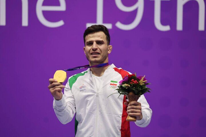 قهرمان آسیا وارد زادگاهش شد قهرمان آسیا وارد زادگاهش شد