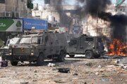یورش صهیونیست‌ها به کرانه باختری با درگیری و انفجار همراه شد