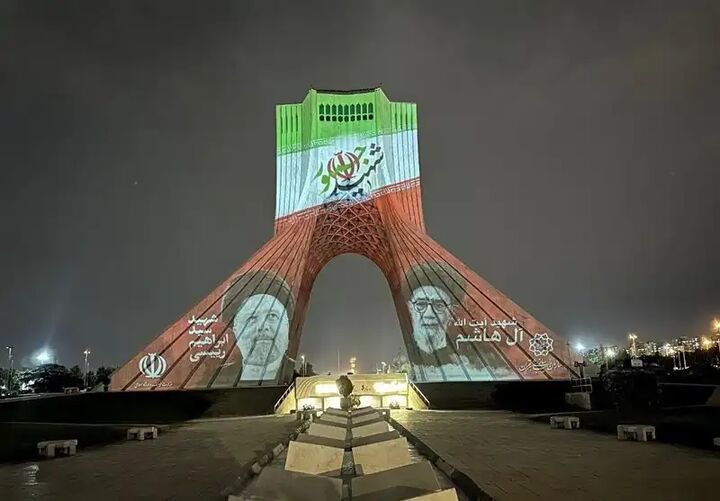 نقش شهید جمهور روی برج آزادی نقش شهید جمهور روی برج آزادی
