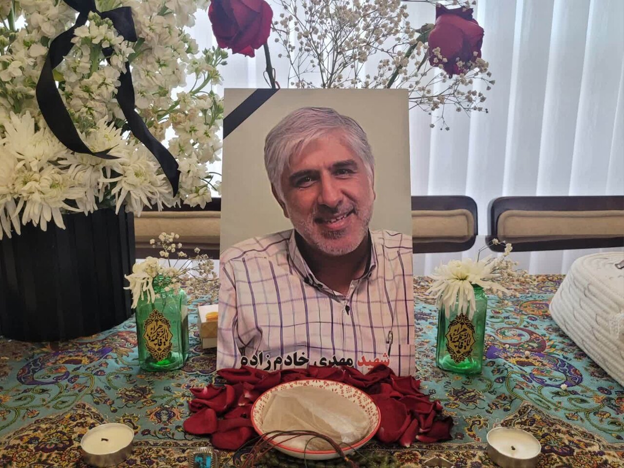 دیدار مدیرکل بنیاد شهید و امور ایثارگران تهران بزرگ با خانواده شهیدان خادمزاده و نیکنژاد