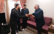 دیدار معاون توسعه مدیریت و منابع بنیاد شهید با خانواده سه شهید کریمی‌نژاد