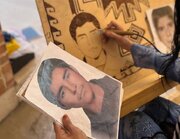 تمثال چهار شهید در آیین صنایع‌دستی منطقه۸ سوخته‌نگاری شد