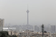 خیزش گرد و خاک و رگبار در تهران