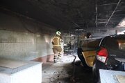 مهار آتش سوزی پارکینگ یک ساختمان اداری در تهران