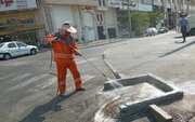 اجرای طرح شستشوی زیر مخزنی‌های پسماند در معابر منطقه ۲۲
