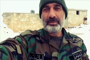 بوسه شهید مدافع حرم بر پرچم ایران در سوریه